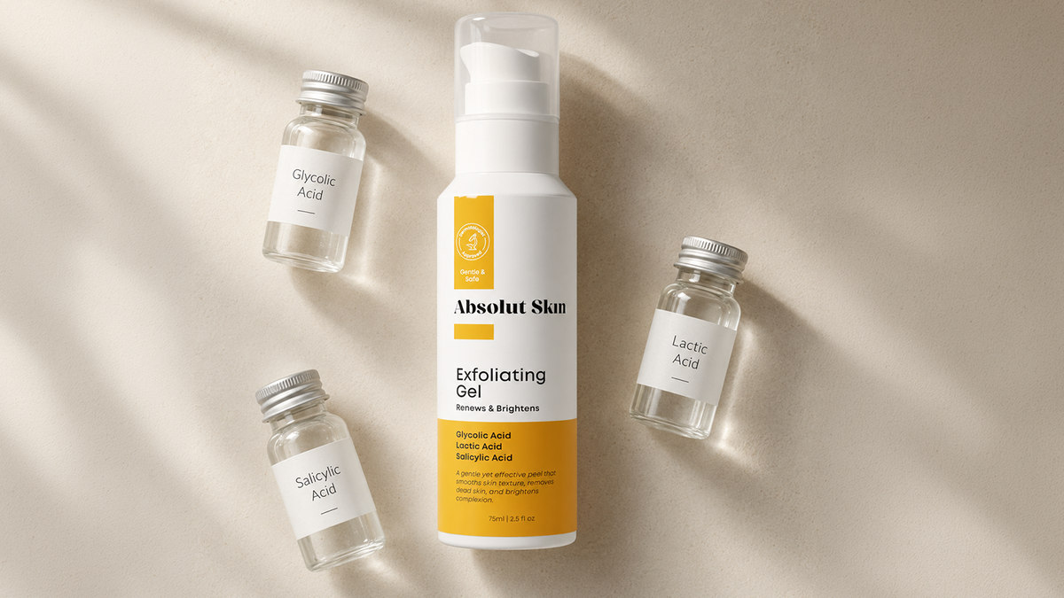 Absolut Skin Exfoliating Gel surrounded by three labeled vials representing glycolic, lactic, and salicylic acid on a warm off-white surface.