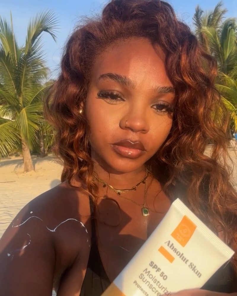 Creator using Absolut Skin SPF 50 Moisturizing Sunscreen