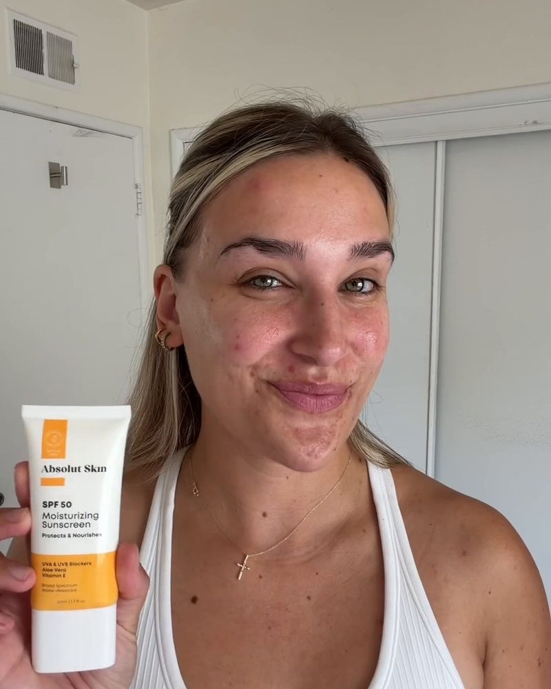 Creator using Absolut Skin SPF 50 Moisturizing Sunscreen