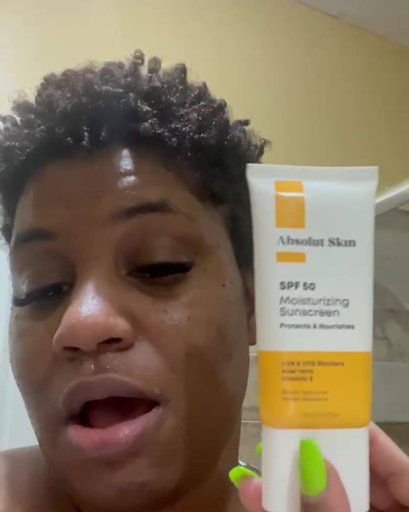Creator using Absolut Skin SPF 50 Moisturizing Sunscreen